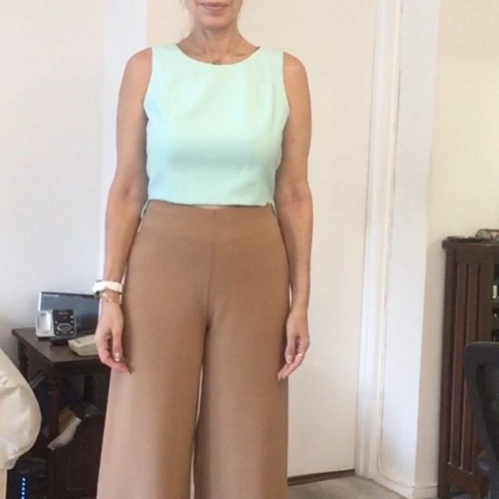 Very light green aqua sleeveless top size L